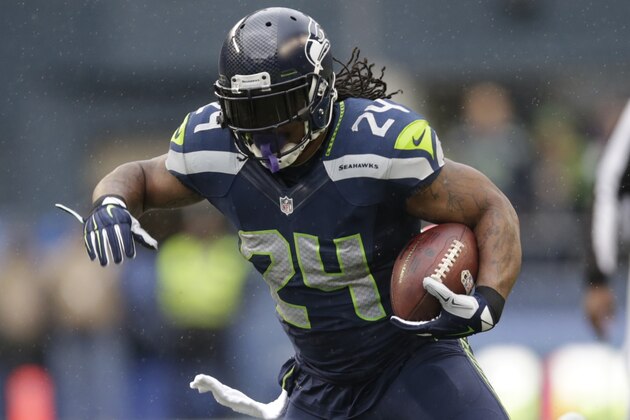 Seattle Seahawks running back Marshawn Lynch (24) runs against the New York Giants in the first half of an NFL football game, Sunday, Nov. 9, 2014, in Seattle. (AP Photo/Scott Eklund)