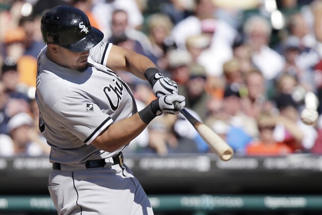DETROIT, MI - SEPTEMBER 24:  Jose Abreu #79 of the Chicago White Sox singles against the Detroit Tigers during the sixth inning at Comerica Park on September 24, 2014, in Detroit, Michigan. The Tigers defeated the White Sox 6-1. (Photo by Duane Burleson/Getty Images)