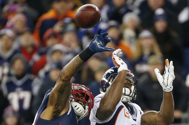 New England Patriots cornerback Brandon Browner (39) breaks up a pass intended for Denver Broncos wide receiver Demaryius Thomas (88) in the first half of an NFL football game on Sunday, Nov. 2, 2014, in Foxborough, Mass. (AP Photo/Elise Amendola)