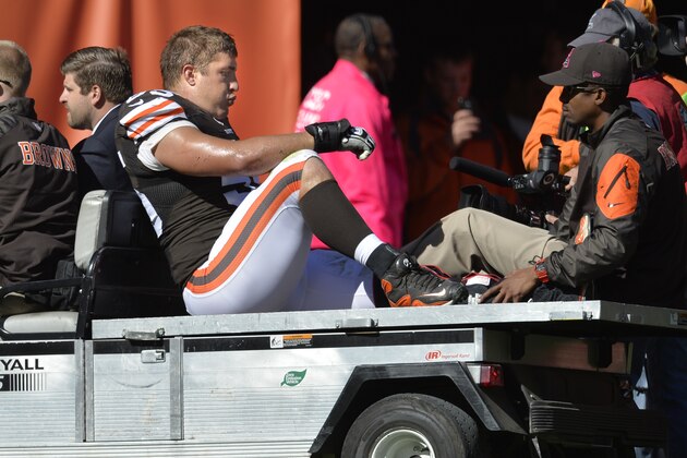 Cleveland Browns center Alex Mack is carted from the field during an NFL football game against the Pittsburgh Steelers Sunday, Oct. 12, 2014, in Cleveland. Cleveland won 31-10. Mack suffered a broken left fibula. (AP Photo/David Richard)