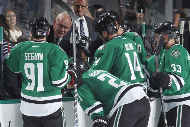 DALLAS, TX - NOVEMBER 6: Lindy Ruff, head coach of the Dallas Stars gives late game instructions to his team against the Nashville Predators at the American Airlines Center on November 6, 2014 in Dallas, Texas. (Photo by Glenn James/NHLI via Getty Images)
