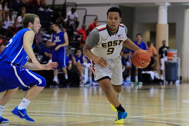 Jul 18, 2013; Washington, DC, USA; Team USA East player Isaiah Briscoe (9) dribbles the ball as Team France player Valentin Estienne (5) defends during the Nike Global Challenge at Trinity University in Washington, DC. Mandatory Credit: Geoff Burke-USA TODAY Sports