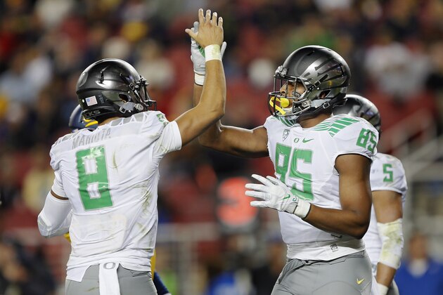 SANTA CLARA, CA - OCTOBER 24:  Tight end Pharoah Brown #85 of the Oregon Ducks celebrates a touchdown catch with quarterback Marcus Mariota #8 against the California Golden Bears in the second quarter on October 24, 2014 at Levi's Stadium in Santa Clara, California.  Oregon won 59-41.  (Photo by Brian Bahr/Getty Images)