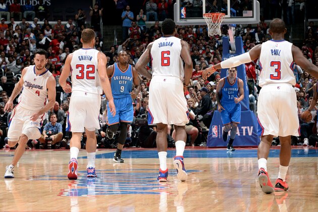 LOS ANGELES, CA - OCTOBER 30: Blake Griffin #32, DeAndre Jordan #6, and Chris Paul #3 of the Los Angeles Clippers run down the court during a game against the Oklahoma City Thunder on October 30, 2014 at Staples Center in Los Angeles, California. NOTE TO USER: User expressly acknowledges and agrees that, by downloading and or using this Photograph, user is consenting to the terms and conditions of the Getty Images License Agreement. Mandatory Copyright Notice: Copyright 2014 NBAE (Photo by Noah Graham/NBAE via Getty Images)