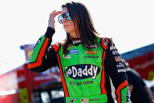 AVONDALE, AZ - NOVEMBER 08:  Danica Patrick, driver of the #10 GoDaddy Chevrolet, stands in the garage area during practice for the NASCAR Sprint Cup Series Quicken Loans 500 at Phoenix International Raceway on November 8, 2014 in Avondale, Arizona.  (Photo by Tom Pennington/Getty Images)