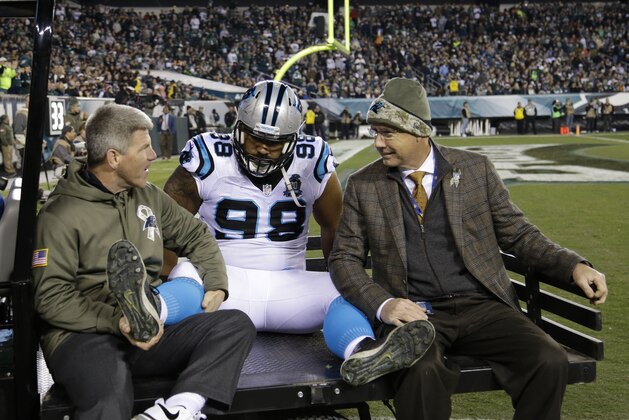 Carolina Panthers' Star Lotulelei (98) is carted off the field after an injury during the second half of an NFL football game against the Philadelphia Eagles, Monday, Nov. 10, 2014, in Philadelphia. (AP Photo/Matt Rourke)