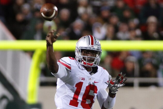 Ohio State quarterback J.T. Barrett throws a pass during the second quarter of an NCAA college football game against Michigan State, Saturday, Nov. 8, 2014, in East Lansing, Mich. Ohio State won 49-37. (AP Photo/Al Goldis)