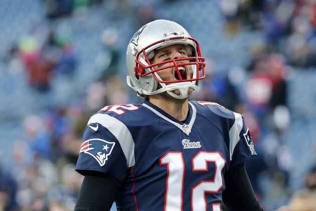 New England Patriots quarterback Tom Brady (12) shouts as he takes the field at Gillette Stadium before an NFL football game against the Denver Broncos on Sunday, Nov. 2, 2014, in Foxborough, Mass. (AP Photo/Elise Amendola)