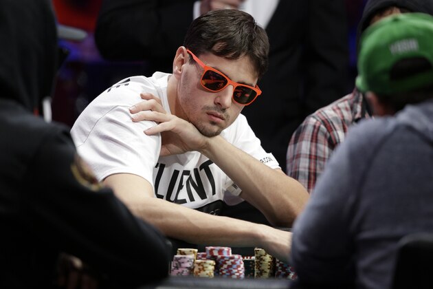 Mark Newhouse competes at the World Series of Poker Final Table Monday, Nov. 10, 2014, in Las Vegas. (AP Photo/John Locher)