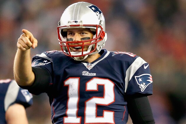FOXBORO, MA - NOVEMBER 02:  Tom Brady #12 of the New England Patriots reacts during the fourth quarter against the Denver Broncos at Gillette Stadium on November 2, 2014 in Foxboro, Massachusetts.  (Photo by Jim Rogash/Getty Images)