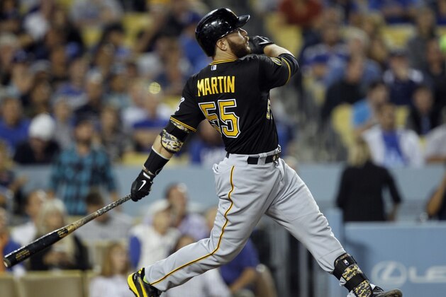 Pittsburgh Pirates' Russell Martin hits a solo home run against the Los Angeles Dodgers in the sixth inning of a baseball game on Thursday, May 29, 2014 in Los Angeles. (AP Photo/Alex Gallardo)