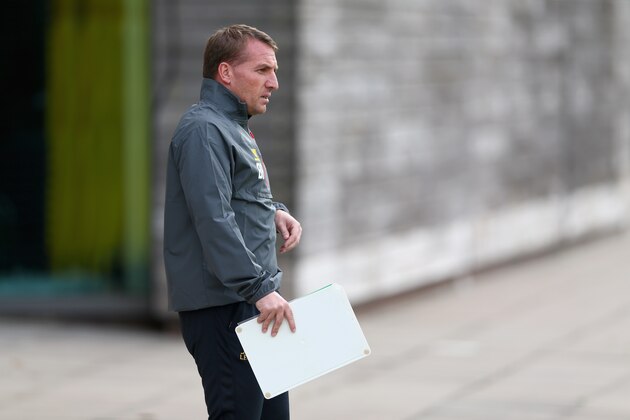 LIVERPOOL, ENGLAND - SEPTEMBER 15:  Liverpool manager Brendan Rodgers walks out of the teams Melwood headquarters to take Liverpool's first Champions League open training session for 5 years  ahead of their UEFA Champions League group B match against PFC Ludogorets on September 15, 2014 in Liverpool, United Kingdom.  (Photo by Clive Brunskill/Getty Images)