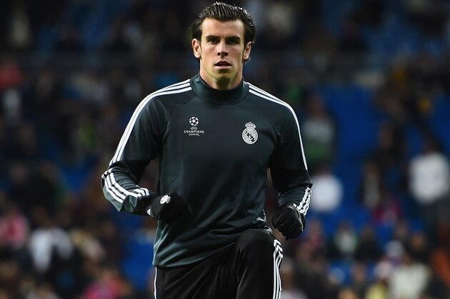 MADRID, SPAIN - NOVEMBER 04:  Gareth Bale of Real Madrid CF warms up prior to  the UEFA Champions League Group B match between Real Madrid CF and Liverpool FC at Estadio Santiago Bernabeu on November 4, 2014 in Madrid, Spain.  (Photo by Shaun Botterill/Getty Images)
