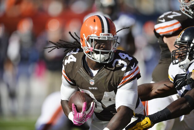 Cleveland Browns running back Isaiah Crowell runs against the Pittsburgh Steelers in the fourth quarter of an NFL football game Sunday, Oct. 12, 2014, in Cleveland. (AP Photo/David Richard)