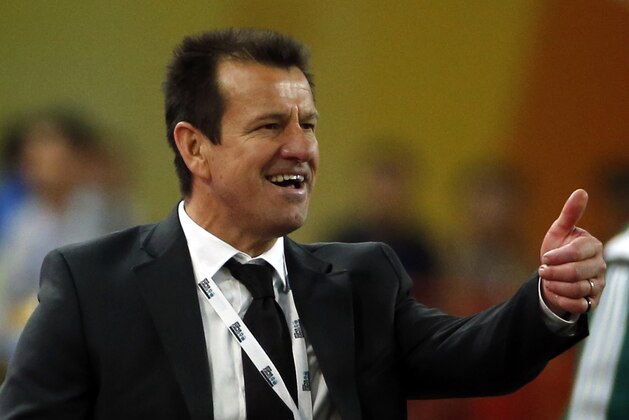 Brazil's coach Dunga gestures during a friendly soccer match against Argentina at the Bird's Nest National Stadium in Beijing Saturday, Oct. 11, 2014. Brazil won 2-0. (AP Photo/Ng Han Guan)