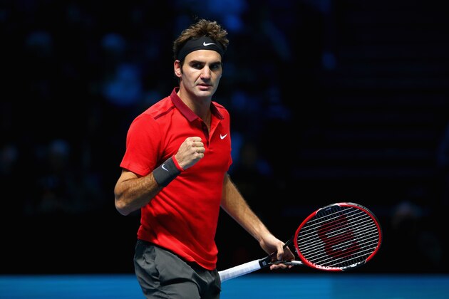 LONDON, ENGLAND - NOVEMBER 11:  Roger Federer of Switzerland celebrates match point in the round robin singles match against Kei Nishikori of Japan on day three of the Barclays ATP World Tour Finals at the O2 Arena on November 11, 2014 in London, England.  (Photo by Clive Brunskill/Getty Images)