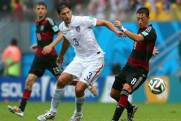 RECIFE, BRAZIL - JUNE 26: Omar Gonzalez of the United States competes for the ball with Mesut Oezil of Germany during the 2014 FIFA World Cup Brazil group G match between the United States and Germany at Arena Pernambuco on June 26, 2014 in Recife, Brazil.  (Photo by Kevin C. Cox/Getty Images)