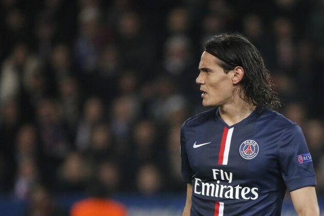 PSG's Edinson Cavani watches his teammates during the Champions League Group F soccer match between Paris Saint Germain and Apoel at Parc des Princes stadium in Paris, France, Wednesday, Nov. 5, 2014. (AP Photo/Francois Mori)