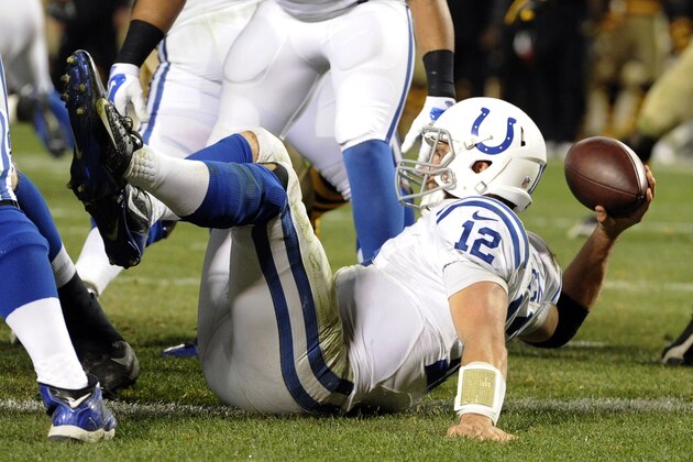 Indianapolis Colts quarterback Andrew Luck (12) passes from the ground in the end zone and a safety was called on the play in the fourth quarter of the NFL football game against the Pittsburgh Steelers, Sunday, Oct. 26, 2014 in Pittsburgh. (AP Photo/Don Wright)