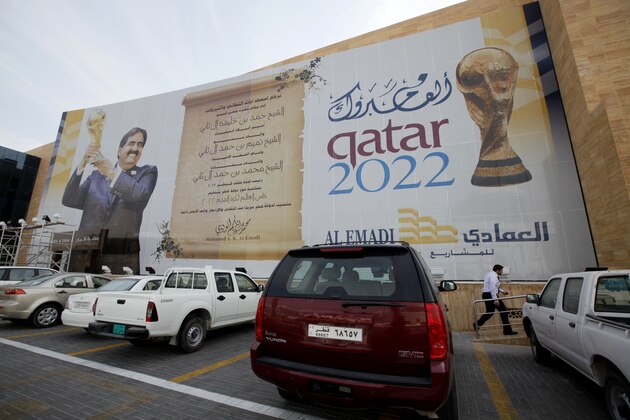 A banner featuring the Qatar 2022 World Cup is hang on the building in Doha, Qatar, Thursday, Jan. 6, 2011. AFC Asian Cup soccer match will kick off on Jan. 7.  (AP Photo/Kin Cheung)