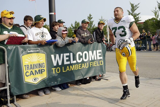 Green Bay Packers’ JC Tretter makes his way to NFL football training camp Monday, July 28, 2014, in Green Bay, Wis. (AP Photo/Morry Gash)