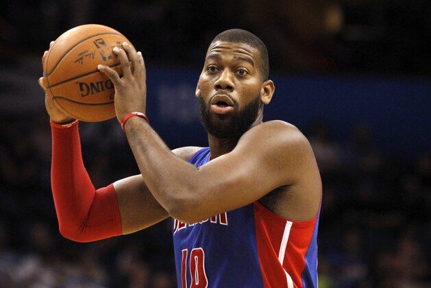 Oct 17, 2014; Orlando, FL, USA; Detroit Pistons forward Greg Monroe (10) grabs a rebound against the Orlando Magic during the first half at Amway Center. Mandatory Credit: Kim Klement-USA TODAY Sports