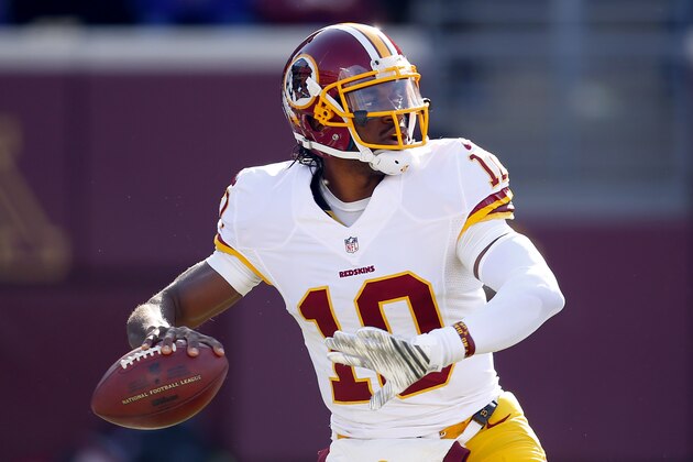 Washington Redskins quarterback Robert Griffin III (10) throws the ball against the Minnesota Vikings during an NFL football game, Sunday, Nov. 2, 2014, in Minneapolis. (Jeff Haynes/AP Images for Panini)