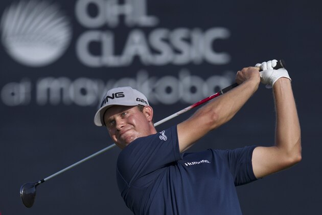 Harris English, from the U.S., tees off on the 16th hole during the OHL Classic at Mayacoba golf tournament in Quintana Roo, Mexico, Sunday, Nov. 17, 2013. English won the tournament. (AP Photo/Christian Palma)