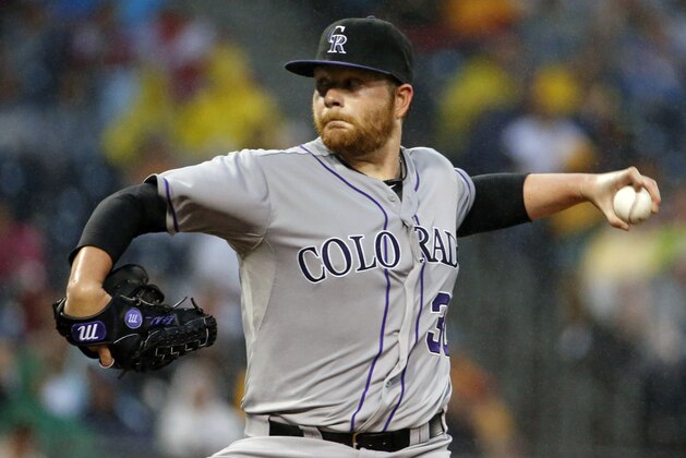 Colorado Rockies starting pitcher Brett Anderson (30) delivers during the third inning of a baseball game against the Pittsburgh Pirates in Pittsburgh Saturday, July 19, 2014. (AP Photo/Gene J. Puskar)