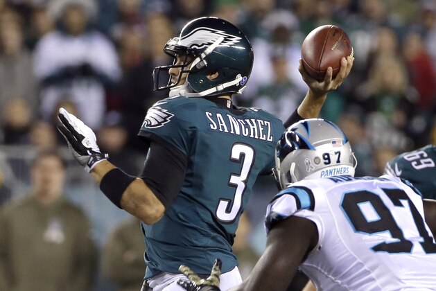 Philadelphia Eagles' Mark Sanchez passes during the first half of an NFL football game against the Carolina Panthers, Monday, Nov. 10, 2014, in Philadelphia. (AP Photo/Matt Rourke)