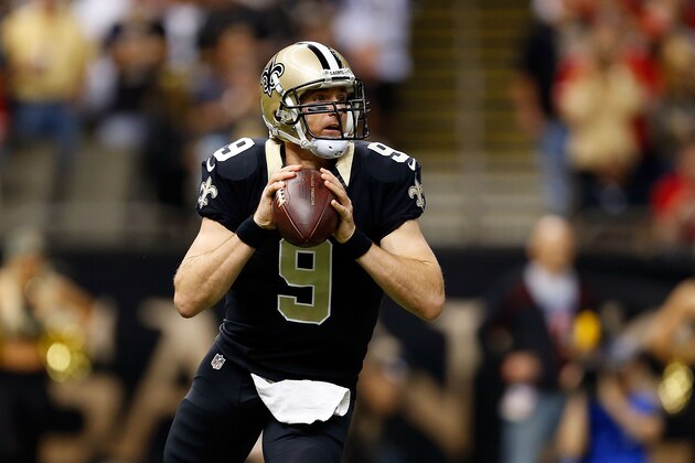 NEW ORLEANS, LA - NOVEMBER 09:  Drew Brees #9 of the New Orleans Saints drops back to pass against the San Francisco 49ers during the first quarter of a game at the Mercedes-Benz Superdome on November 9, 2014 in New Orleans, Louisiana.  (Photo by Wesley Hitt/Getty Images)
