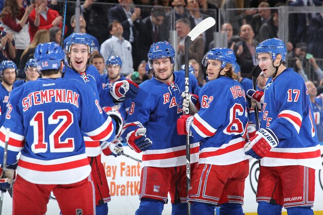 NEW YORK, NY - NOVEMBER 11:  Kevin Klein #8, Lee Stempniak #12, Kevin Hayes #13, Carl Hagelin #62 and John Moore #17 of the New York Rangers celebrate after a first-period goal against the Pittsburgh Penguins at Madison Square Garden on November 11, 2014 in New York City. (Photo by Jared Silber/NHLI via Getty Images)