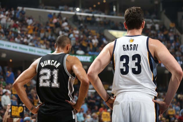 MEMPHIS, TN - MAY 27:  Tim Duncan #21 of the San Antonio Spurs and Marc Gasol #33 of the Memphis Grizzlies look on in Game Four of the Western Conference Finals between the San Antonio Spurs and the Memphis Grizzlies during the 2013 NBA Playoffs on May 27, 2013 at FedExForum in Memphis, Tennessee. NOTE TO USER: User expressly acknowledges and agrees that, by downloading and or using this photograph, user is consenting to the terms and conditions of the Getty Images License Agreement. Mandatory Copyright Notice: Copyright 2013 NBAE (Photos by Joe Murphy/NBAE via Getty Images)