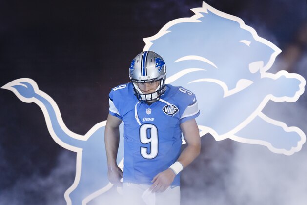 Detroit Lions quarterback Matthew Stafford (9) during player introductions before an NFL football game against the Miami Dolphins at Ford Field in Detroit, Sunday, Nov. 9, 2014. (AP Photo/Rick Osentoski)