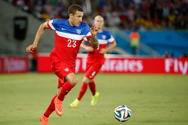 Jun 16, 2014; Natal, Rio Grande do Norte, BRAZIL; United States defender Fabian Johnson (23) carries the ball against Ghana during the second half of their 2014 World Cup game at Estadio das Dunas. Mandatory Credit: Winslow Townson-USA TODAY Sports