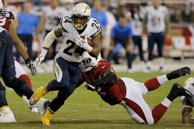 San Diego Chargers running back Ryan Mathews (24) eludes the tackle of Arizona Cardinals free safety Tony Jefferson (22) to score a touchdown during the second half of an NFL football game, Monday, Sept. 8, 2014, in Glendale, Ariz. (AP Photo/Rick Scuteri)