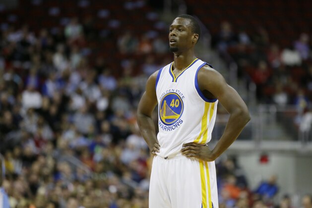 Golden State Warriors forward Harrison Barnes looks on during a pre-season NBA basketball game against the Denver Nuggets, Thursday, Oct. 16, 2014, in Des Moines, Iowa. (AP Photo/Charlie Neibergall)