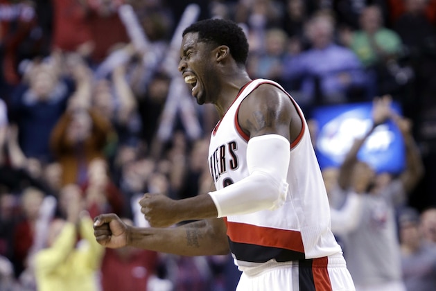 Portland Trail Blazers guard Wesley Matthews celebrates after the Blazers took the lead over the Charlotte Hornets late in the second half of an NBA basketball game in Portland, Ore., Tuesday, Nov. 11, 2014. Portland won 102-100.(AP Photo/Don Ryan)