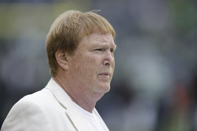 Oakland Raiders owner Mark Davis watches warmups before an NFL football game against the Seattle Seahawks, Sunday, Nov. 2, 2014, in Seattle. (AP Photo/Stephen Brashear)