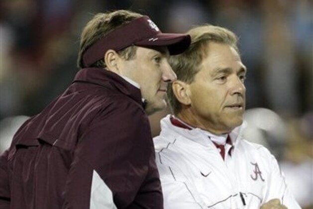 Alabama coach Nick Saban, right, talks with Mississippi State coach Dan Mullen prior to an NCAA college football game at Bryant-Denny Stadium in Tuscaloosa, Ala., Saturday, Oct. 27, 2012. (AP Photo/Dave Martin)