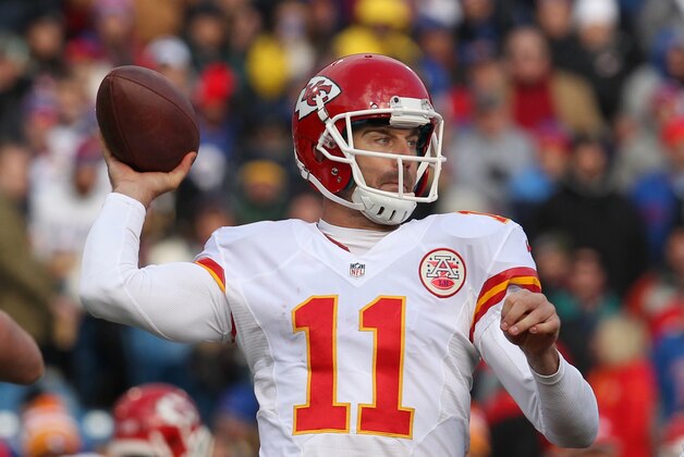 Nov 9, 2014; Orchard Park, NY, USA; Kansas City Chiefs quarterback Alex Smith (11) throws a pass during the second half against the Buffalo Bills at Ralph Wilson Stadium. Kansas City beats Buffalo 17 to 13.  Mandatory Credit: Timothy T. Ludwig-USA TODAY Sports