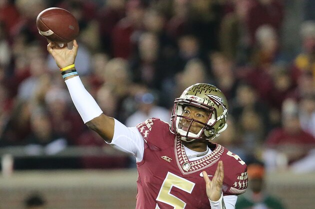 Florida State's Jameis Winston throws for a completion against Virginia in the third quarter of an NCAA college football game, Saturday, Nov. 8, 2014, in Tallahassee, Fla. Florida State won the game 34-20. (AP Photo/Steve Cannon)