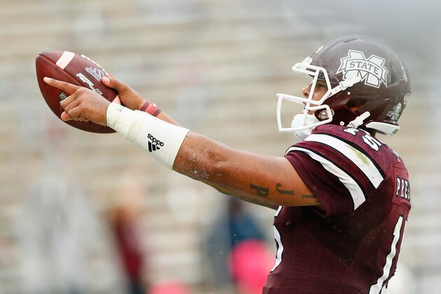 STARKVILLE, MS - OCTOBER 11:  Dak Prescott #15 of the Mississippi State Bulldogs reacts after scoring a touchdown against the Auburn Tigers at Davis Wade Stadium on October 11, 2014 in Starkville, Mississippi.  (Photo by Kevin C. Cox/Getty Images)