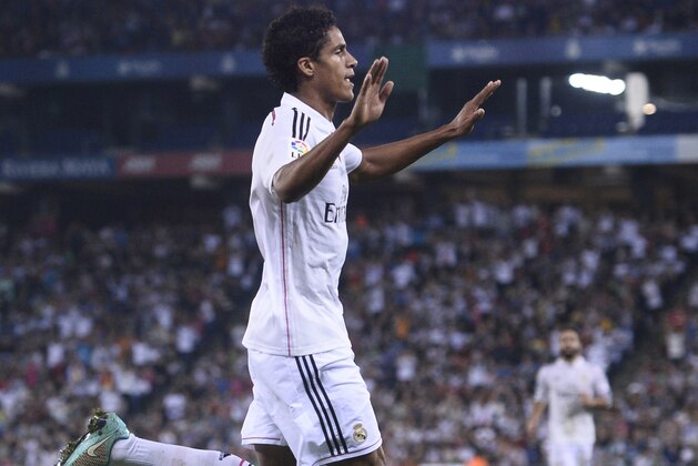 Real Madrid's Raphael Varane reacts after scoring his second goal against Cornella during a Copa del Rey soccer match in Cornella Llobregat, Spain, Wednesday, Oct. 29, 2014. (AP Photo/Manu Fernandez)