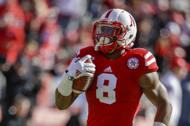 Nebraska running back Ameer Abdullah (8) carries the ball during warmups before an NCAA college football game against Purdue in Lincoln, Neb., Saturday, Nov. 1, 2014. (AP Photo/Nati Harnik)