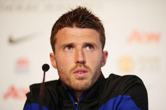 SYDNEY, AUSTRALIA - JULY 19:  Michael Carrick speaks to the media during a Manchester United press conference at Museum of Contemporary Art on July 19, 2013 in Sydney, Australia.  (Photo by Matt King/Getty Images)