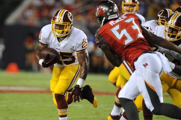 TAMPA, FL - AUGUST 28: Running back Chris Thompson #25 of the Washington Redskins runs against the Tampa Bay Buccaneers at Raymond James Stadium on August 28, 2014 in Tampa, Florida. (Photo by Cliff McBride/Getty Images)