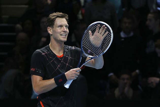 Czech Republic's Tomas Berdych reacts after defeating Croatia's Marin Cilic following their singles ATP World Tour tennis finals match at the O2 arena in London, Wednesday, Nov. 12, 2014. (AP Photo/Alastair Grant)