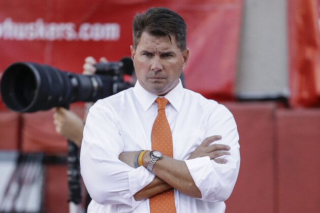 Miami head coach Al Golden follows warm ups before an NCAA college football game against Nebraska in Lincoln, Neb., Saturday, Sept. 20, 2014. (AP Photo/Nati Harnik)