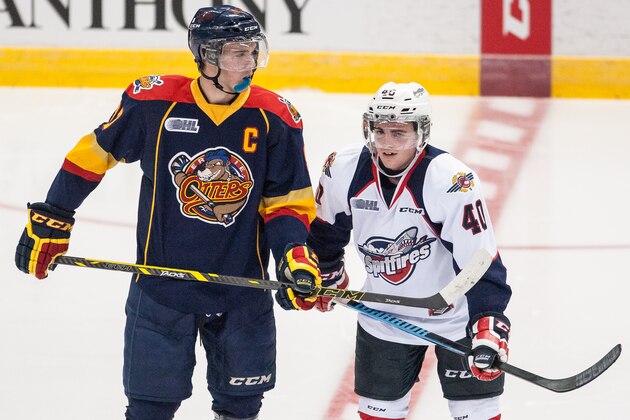 WINDSOR, ON - SEPTEMBER 26: Connor McDavid #97 of the Erie Otters prepares for a faceoff against Ryan Moore #40 of the Windsor Spitfires on September 26, 2014 at the WFCU Centre in Windsor, Ontario, Canada. (Photo by Dennis Pajot/Getty Images)